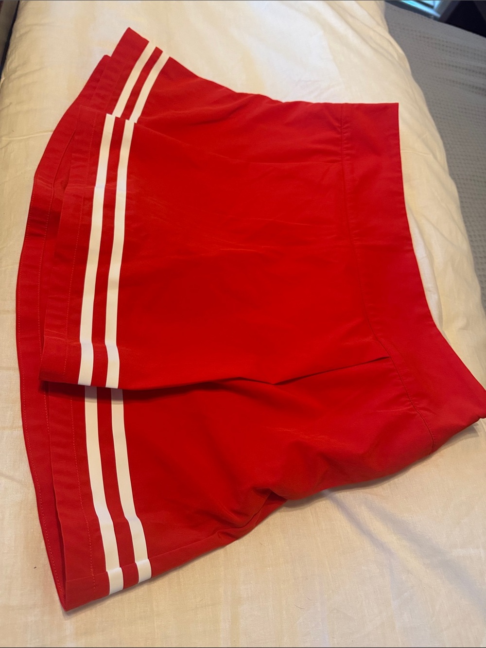 Calia Women's Red Tennis Skirt with White Stripe Detail
